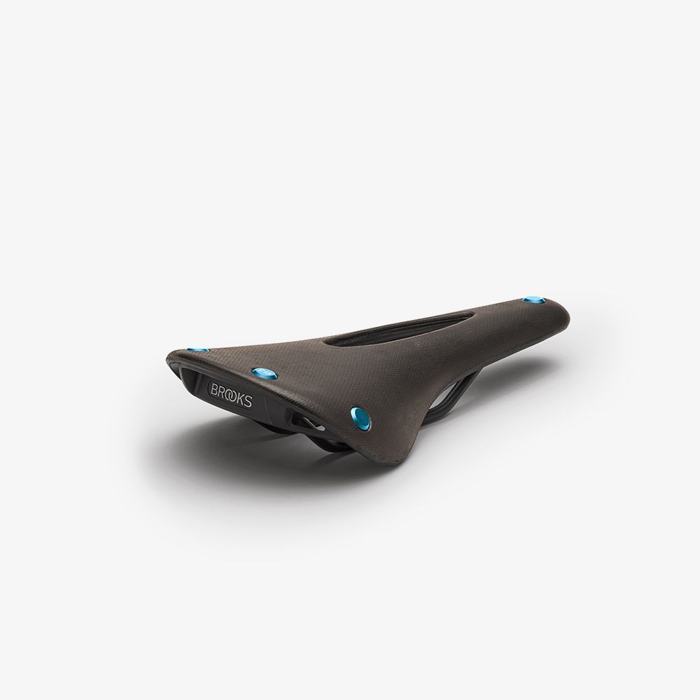 1-c15_carved_bronze_turquoise_cambium_saddle_3-4
